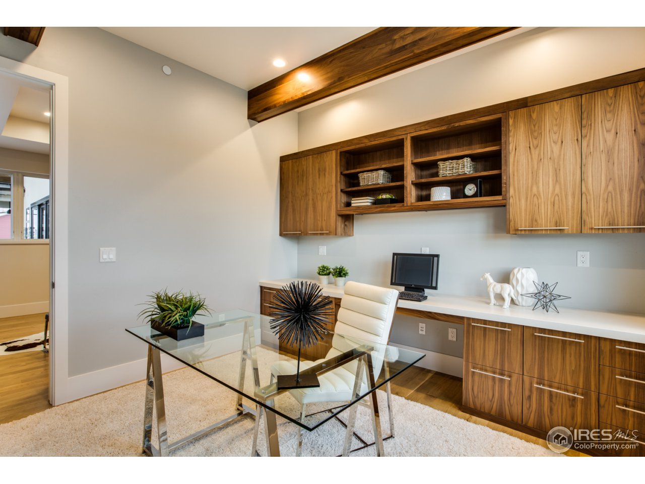 7412 Deerfield Road Longmont, CO 80503 - Photo 16 of 37 Stunning Home Office with Walnut-wrapped Beams