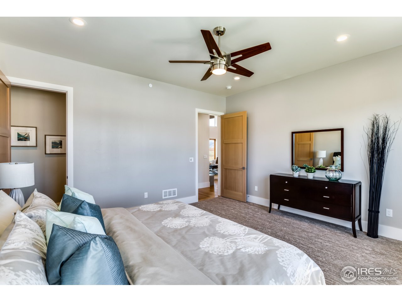 7412 Deerfield Road Longmont, CO 80503 - Photo 19 of 37 Expansive Main Floor Junior Master Suite