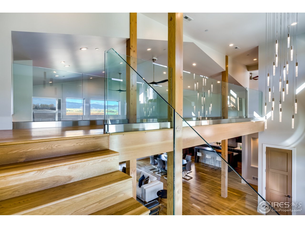 7412 Deerfield Road Longmont, CO 80503 - Photo 21 of 37 Custom Glass Railings and Elegant Lighting