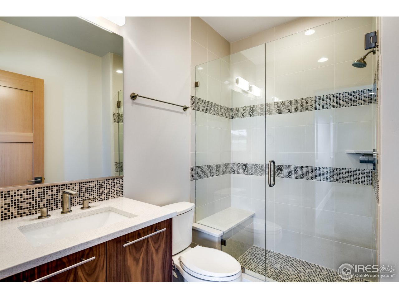 7412 Deerfield Road Longmont, CO 80503 - Photo 29 of 37 Beautiful Custom Tile in all Baths