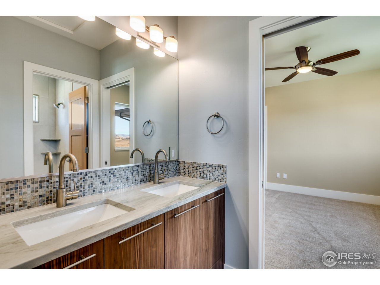 7412 Deerfield Road Longmont, CO 80503 - Photo 34 of 37 Full Jack and Jill Bath