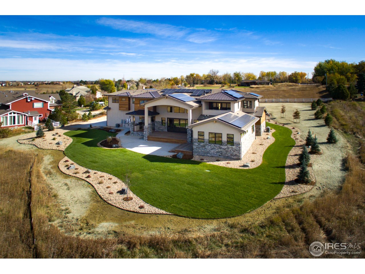 7412 Deerfield Road Longmont, CO 80503 - Photo 5 of 37 Professional Landscaping Surrounds Property