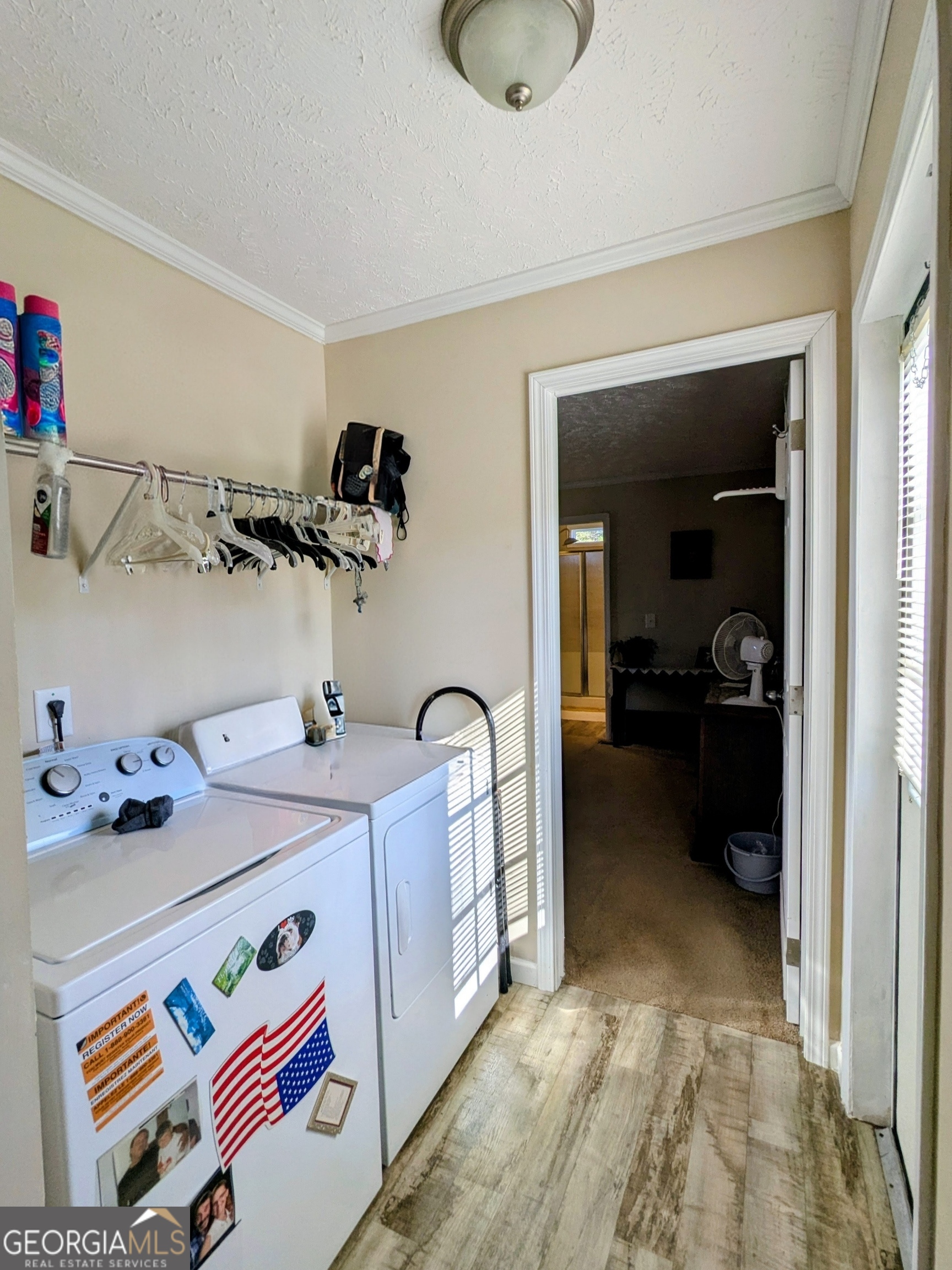 1282 Ga Highway Lyons, GA 30436 - Photo 12 of 21 a bedroom with a bed and cabinets