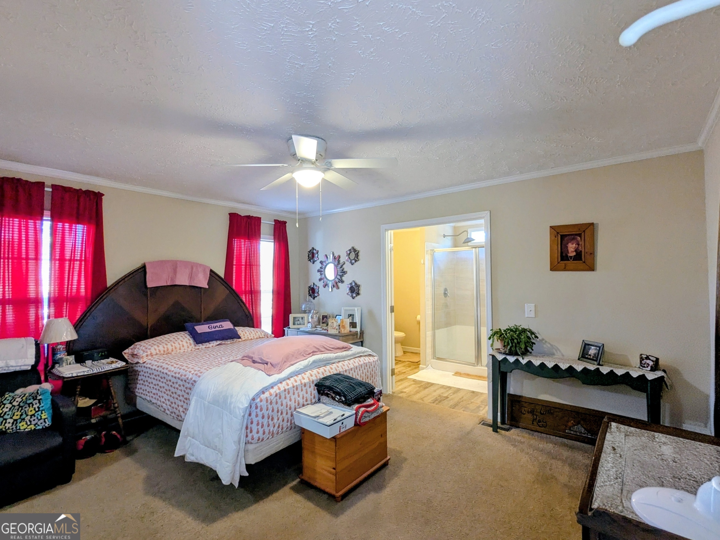1282 Ga Highway Lyons, GA 30436 - Photo 16 of 21 a bedroom with bed and window