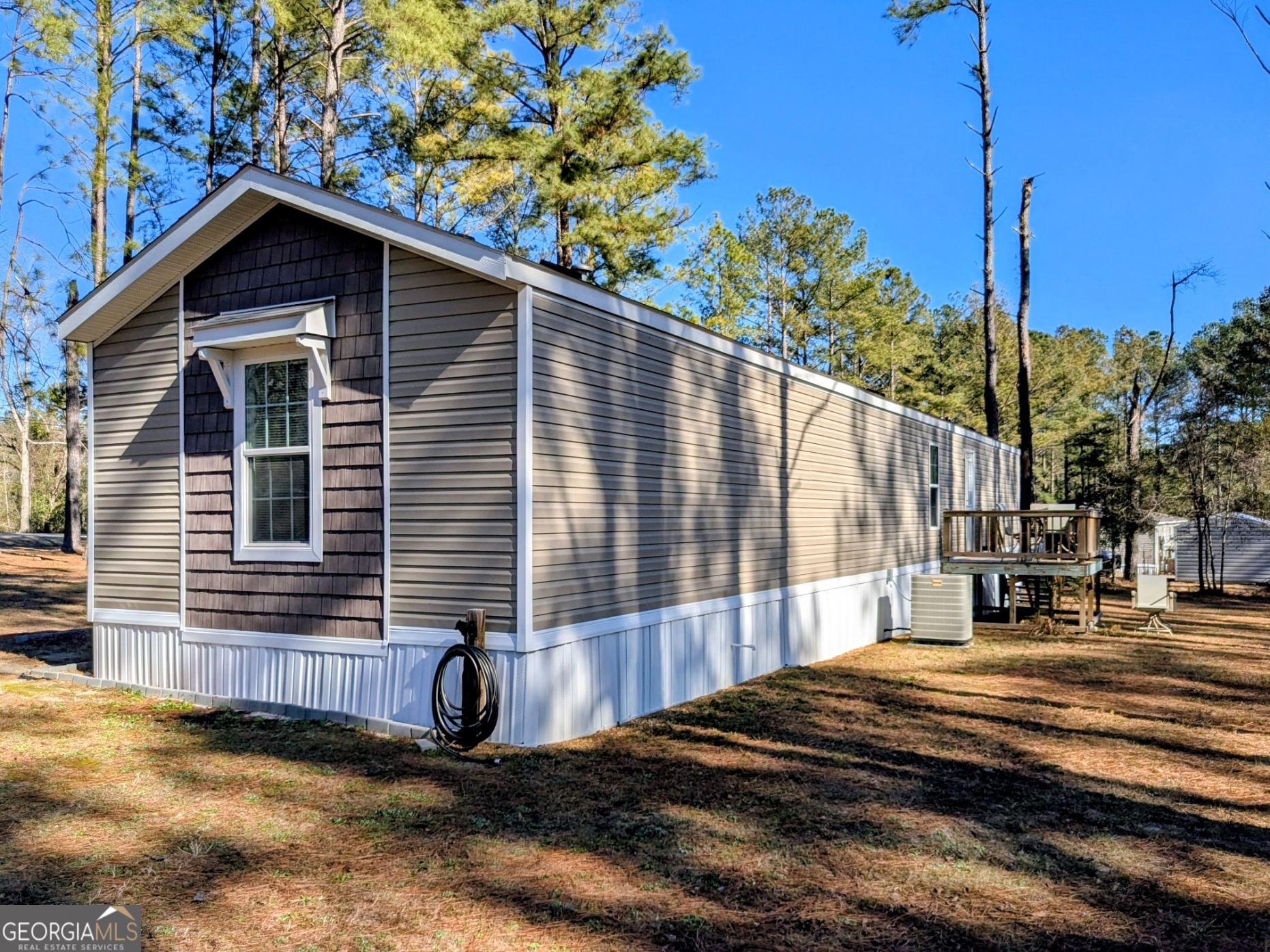 1282 Ga Highway Lyons, GA 30436 - Photo 3 of 21 a view of a house with a yard