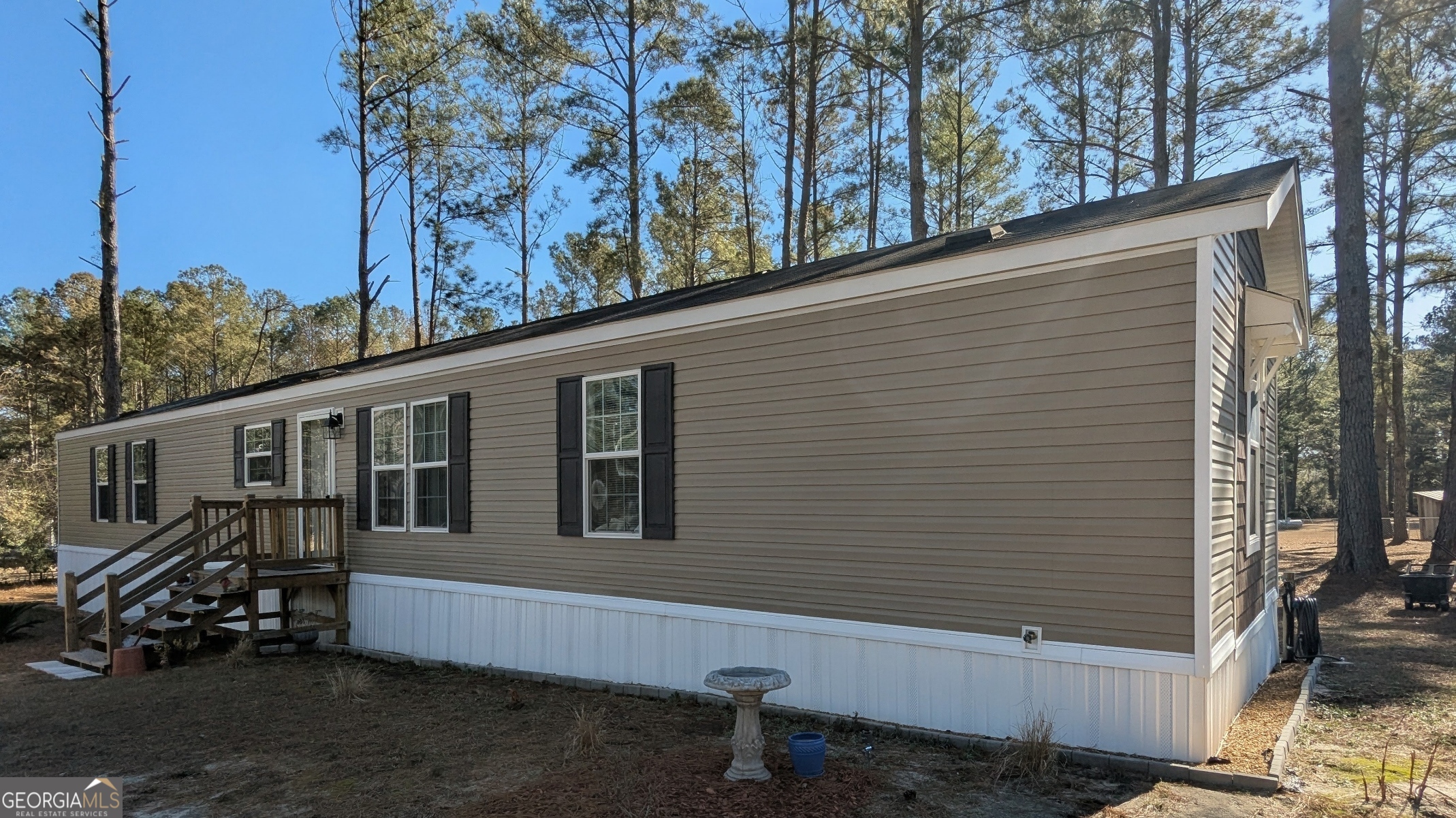 1282 Ga Highway Lyons, GA 30436 - Photo 4 of 21 a view of a house with a yard