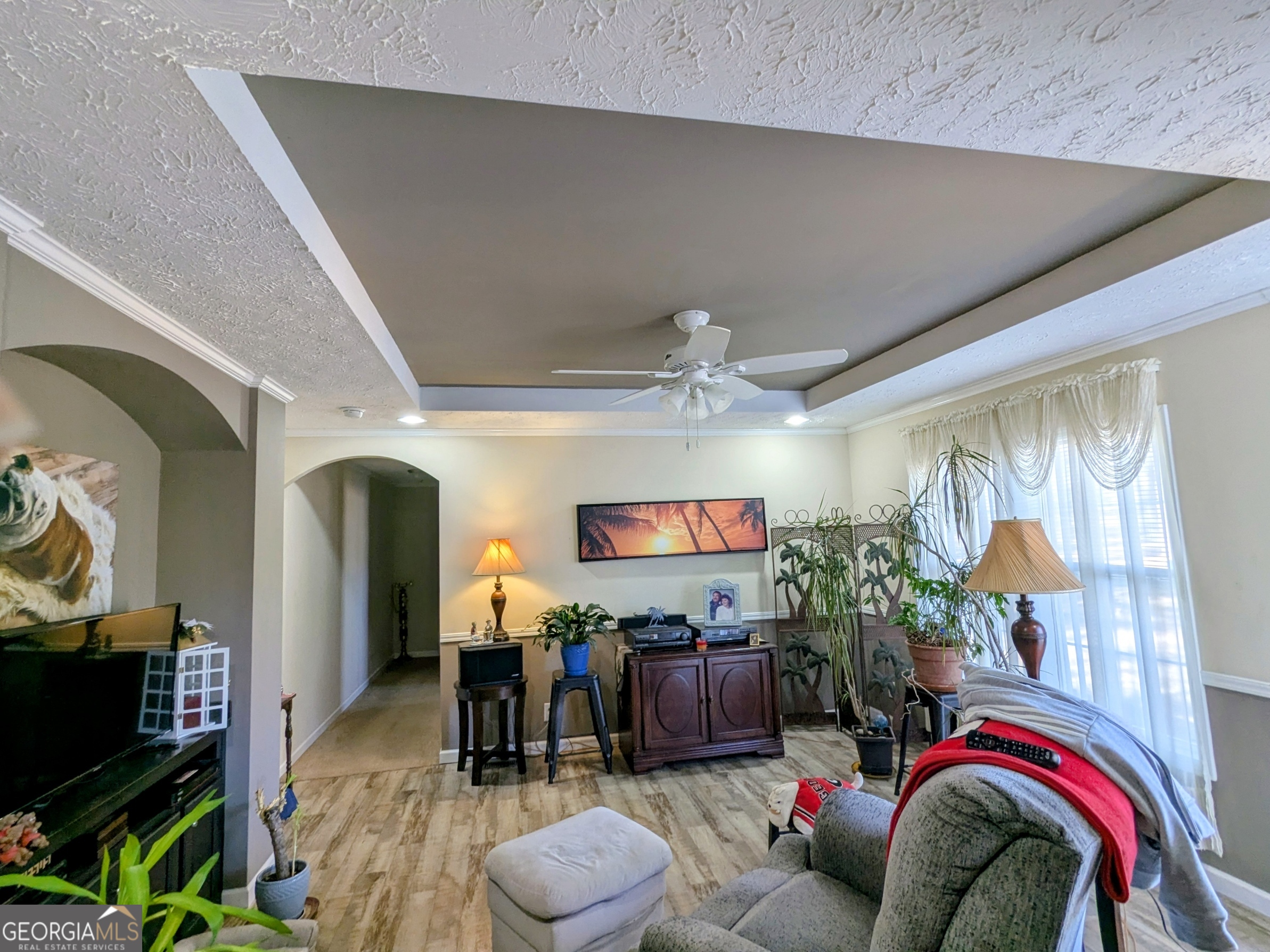 1282 Ga Highway Lyons, GA 30436 - Photo 6 of 21 a living room with furniture and a flat screen tv