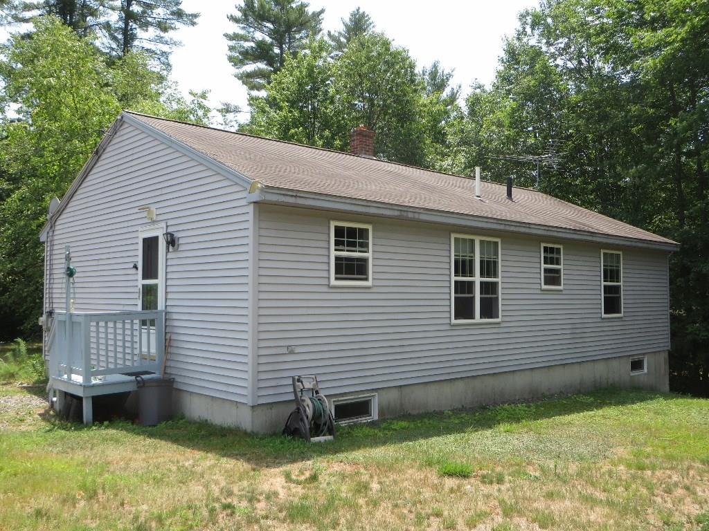 650 Townhouse Road East Waterboro, ME 04030 - Photo 16 of 19 Exterior side and rear of the home.