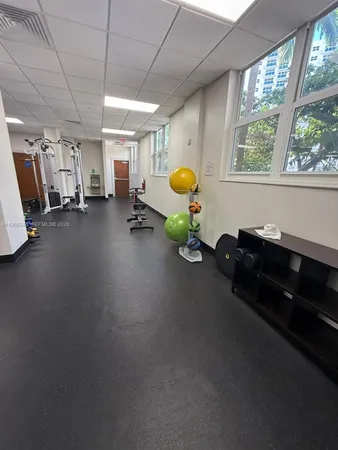 a view of a room with gym equipment
