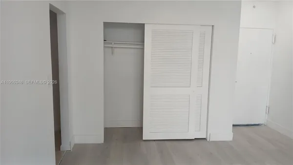 an empty room with closet