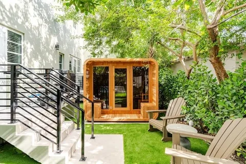 a view of backyard with green space