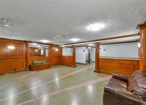 65-15 38th Avenue, Unit 2A Queens, NY 11377 - Photo 12 of 16 a view of a room with gym equipment