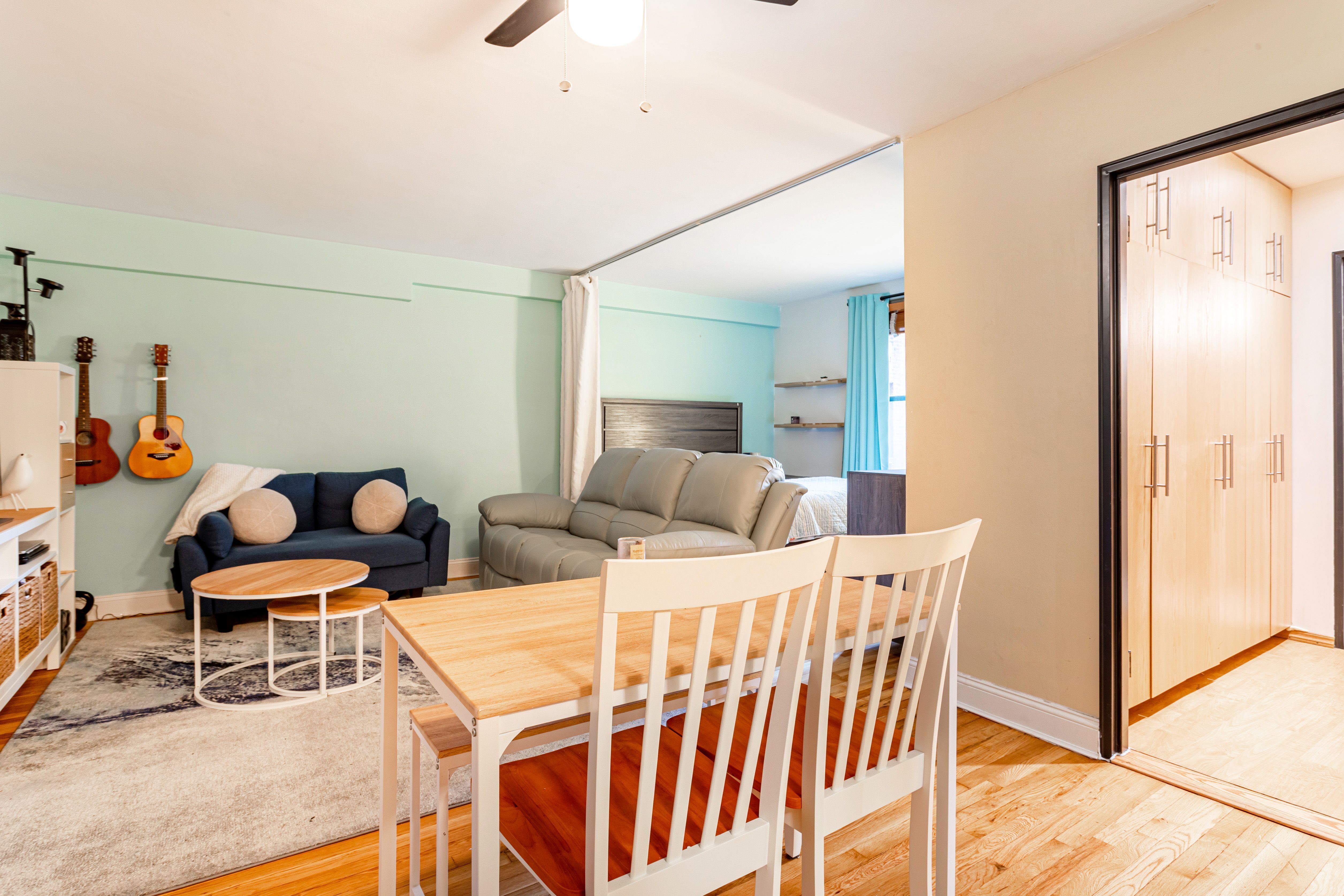 65-15 38th Avenue, Unit 2A Queens, NY 11377 - Photo 4 of 16 a dining room with furniture and a table
