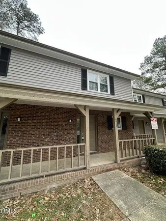 a front view of a house with a garage