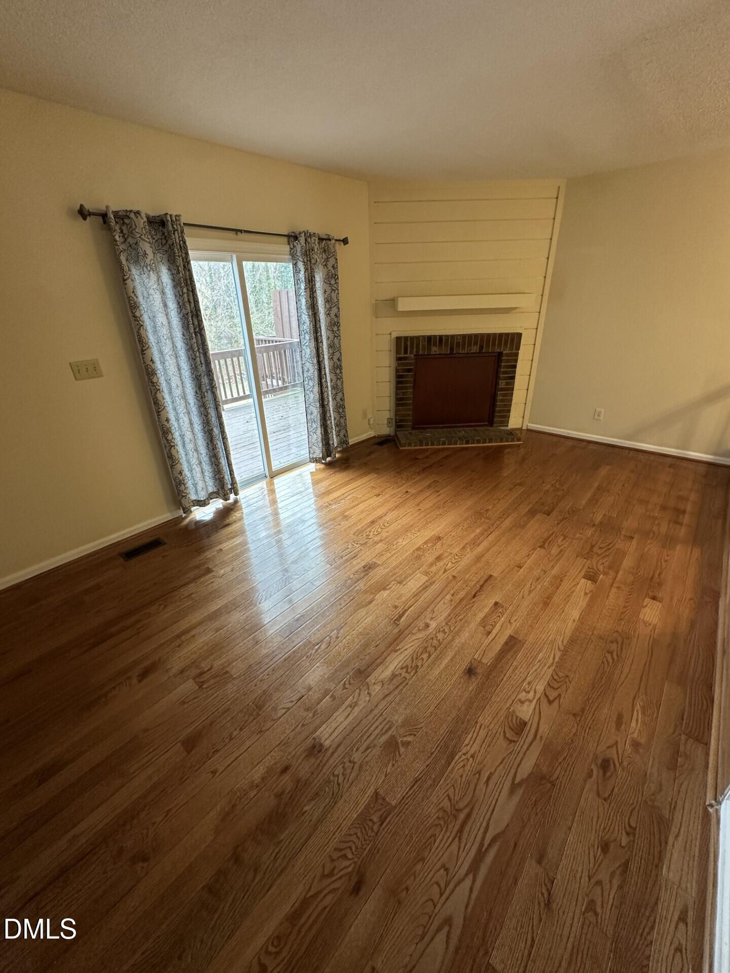 4912 North New Hope Road Raleigh, NC 27616 - Photo 5 of 14 wooden floor in an empty room