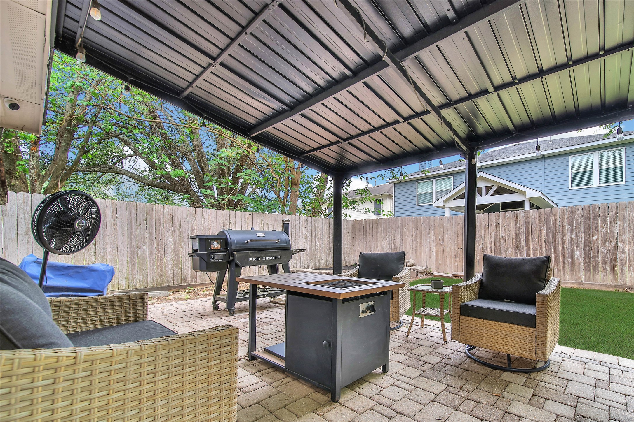 4843 Drew Forest Lane Humble, TX 77346 - Photo 20 of 21 Step out onto the wonderful covered area that is the perfect spot to relax in the shade.