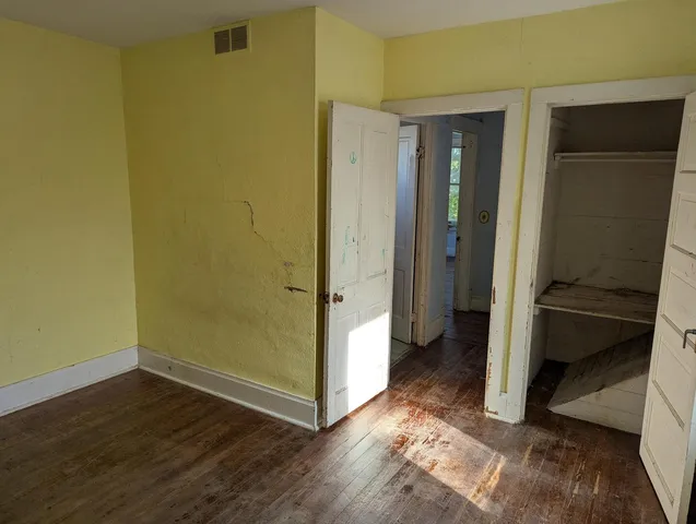a kitchen with a stove a sink and a refrigerator