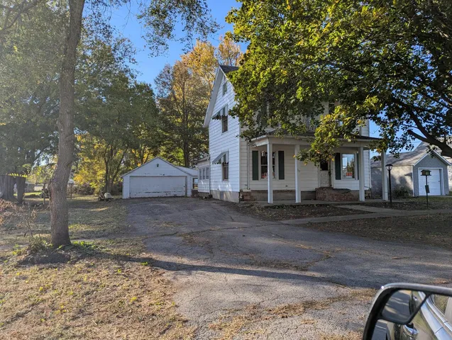 a front view of a house with street