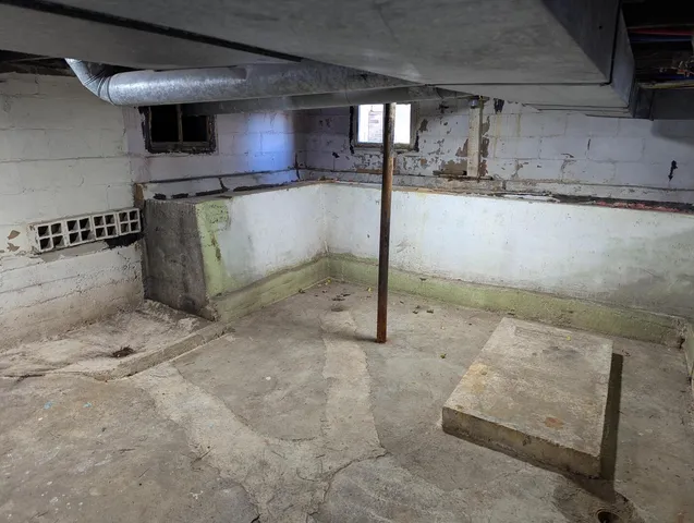 a kitchen with stainless steel appliances granite countertop a stove and a refrigerator