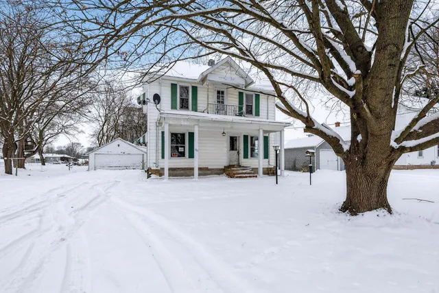 a large kitchen with a large window