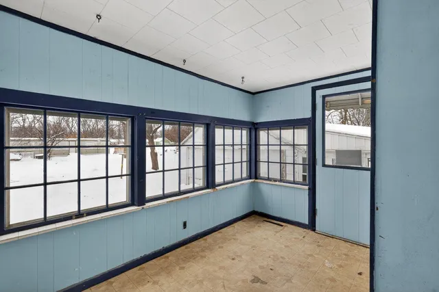 a view of empty room with a window