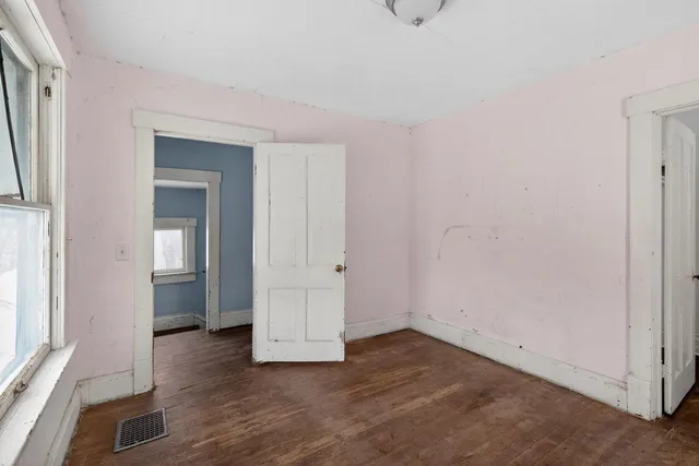 a bathroom with a toilet and a sink