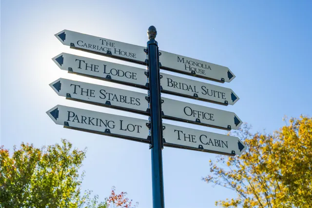 a swimming pool with outdoor seating and yard