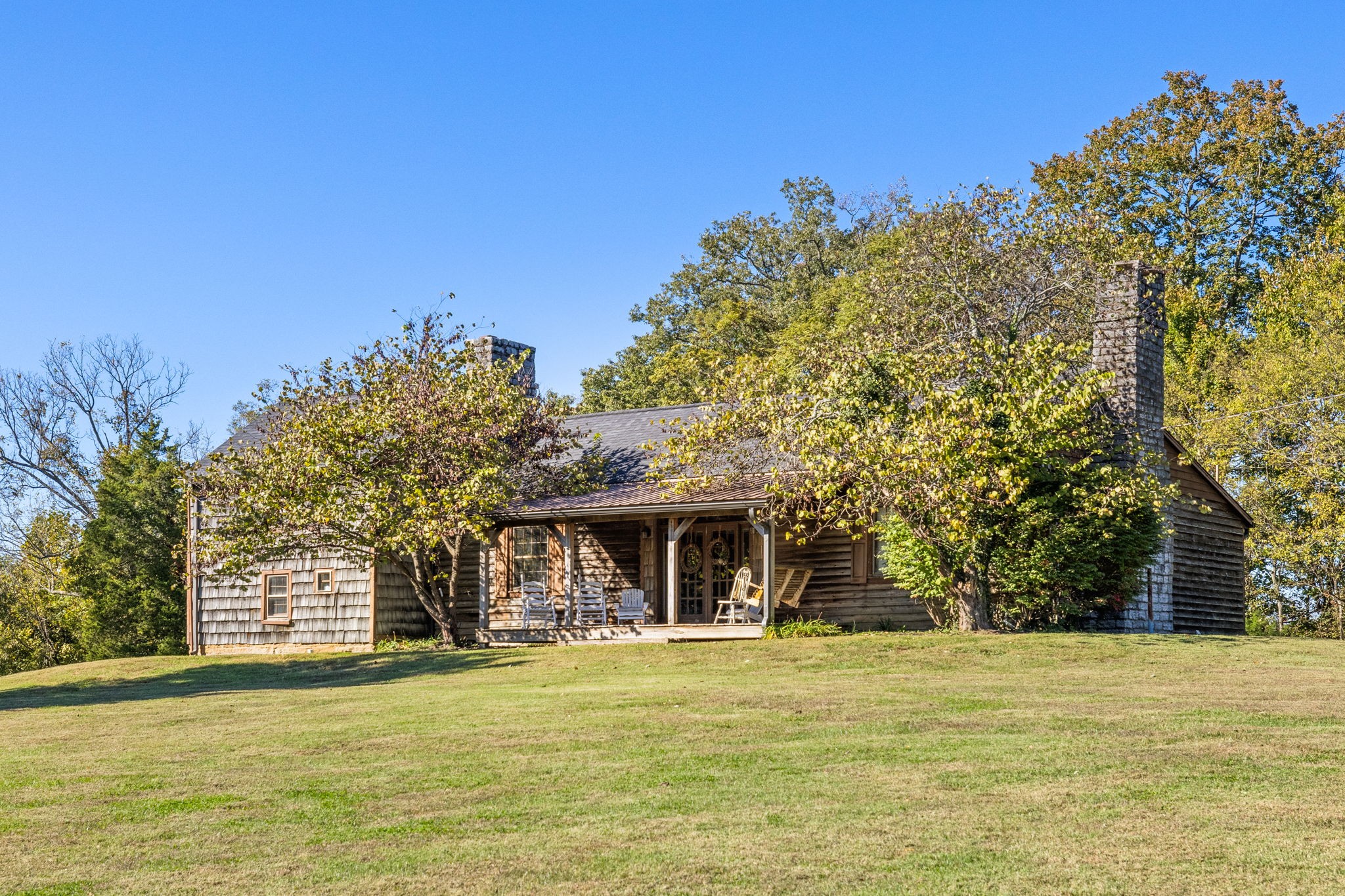 2133 Allisona Road Eagleville, TN 37060 - Photo 65 of 100 a front view of a house with a garden and tree
