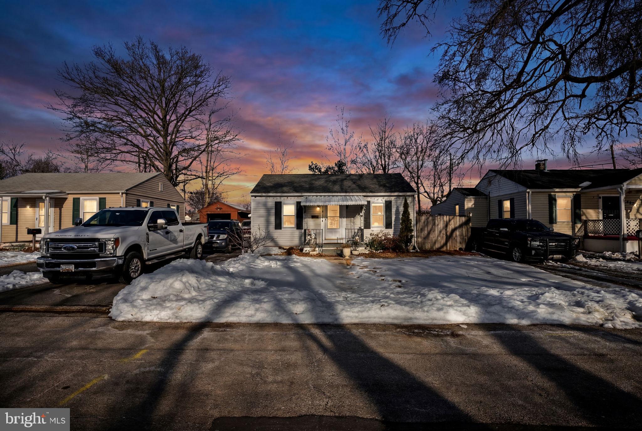 1812 Kitty Hawk Road Essex, MD 21221 - Photo 1 of 44 a front view of a house with a yard