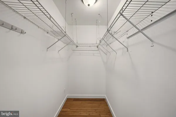 a view of a room with racks on the wall