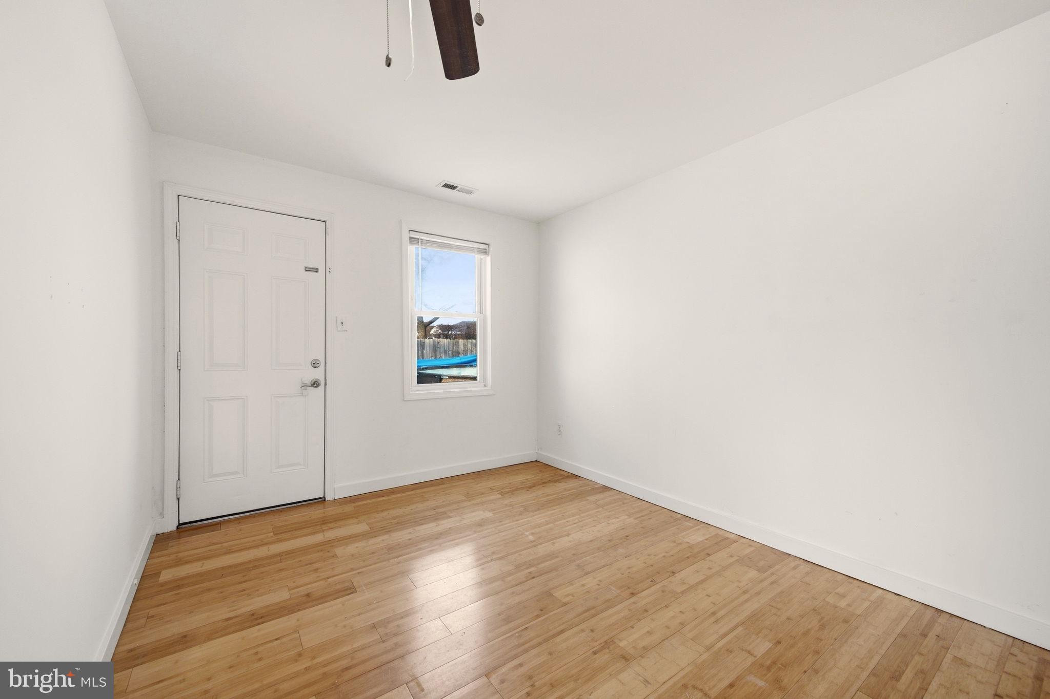 1812 Kitty Hawk Road Essex, MD 21221 - Photo 29 of 44 wooden floor in an empty room