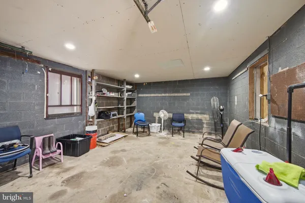 a room with furniture and air hockey table