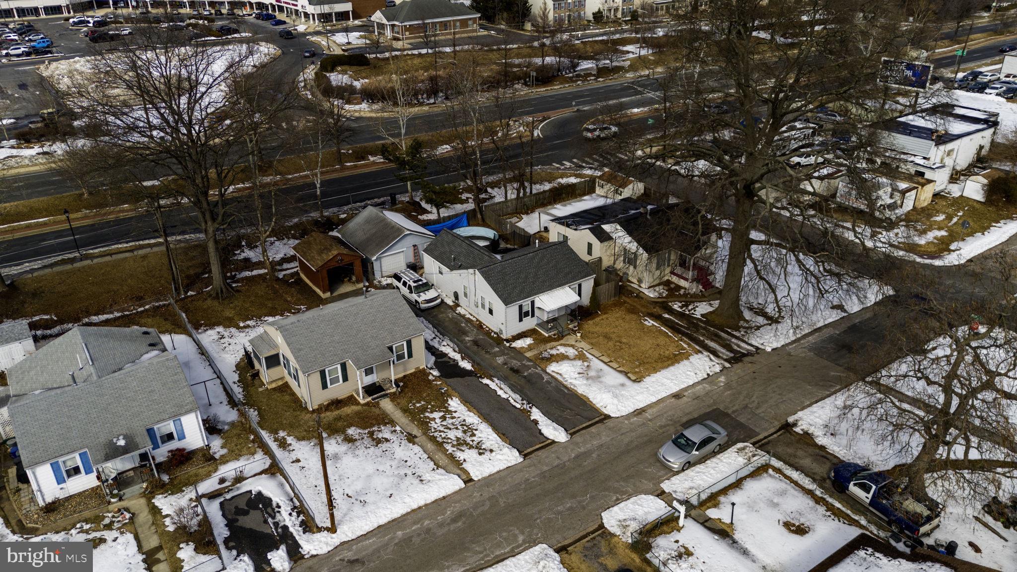 1812 Kitty Hawk Road Essex, MD 21221 - Photo 40 of 44 an aerial view of a house with parking space
