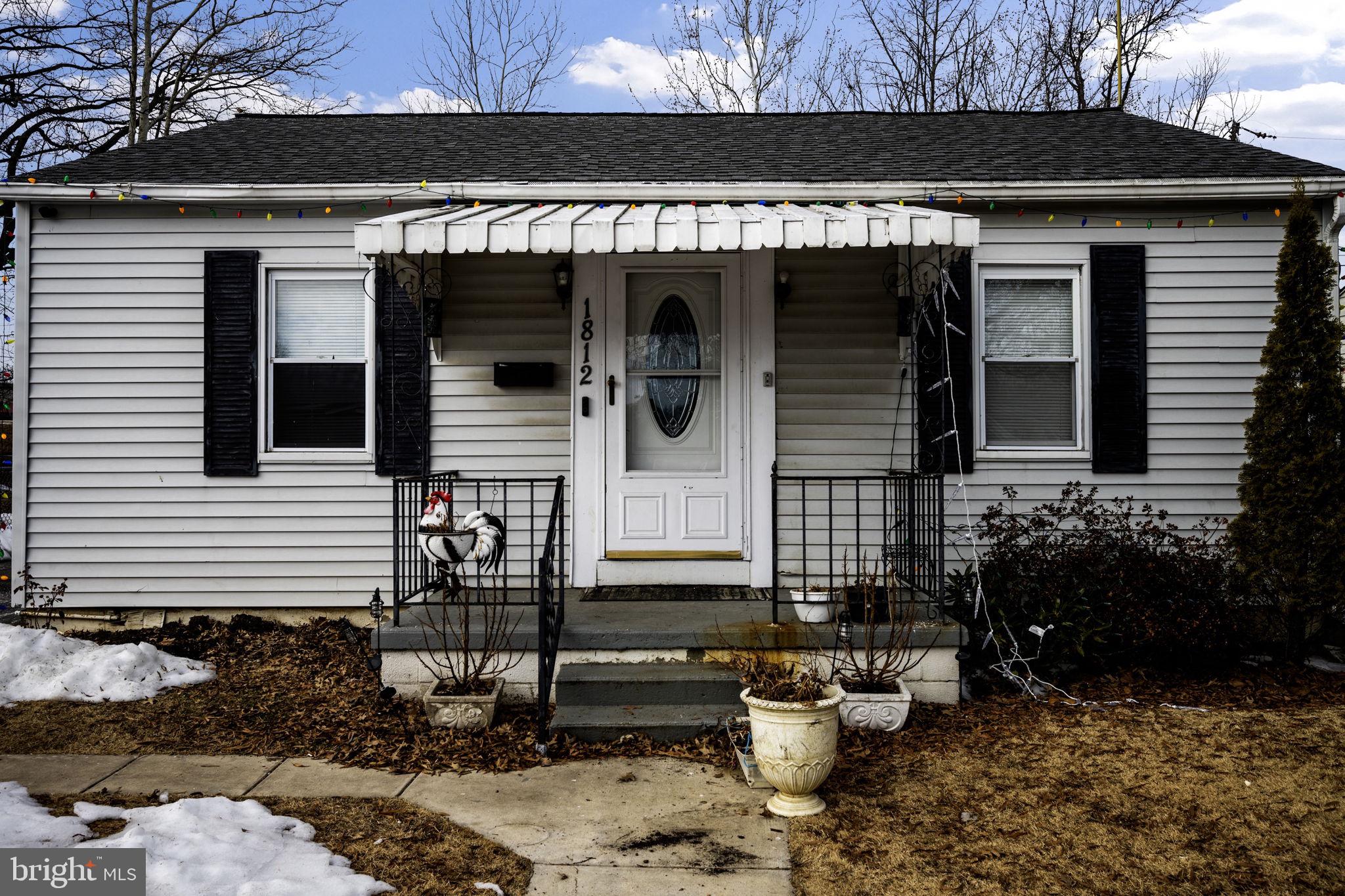1812 Kitty Hawk Road Essex, MD 21221 - Photo 5 of 44 a front view of a house