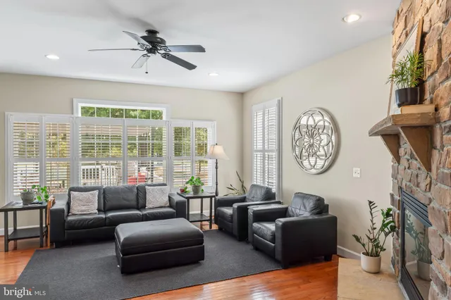 a kitchen with refrigerator and cabinets