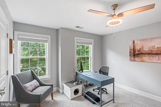 a room with furniture and a flat screen tv