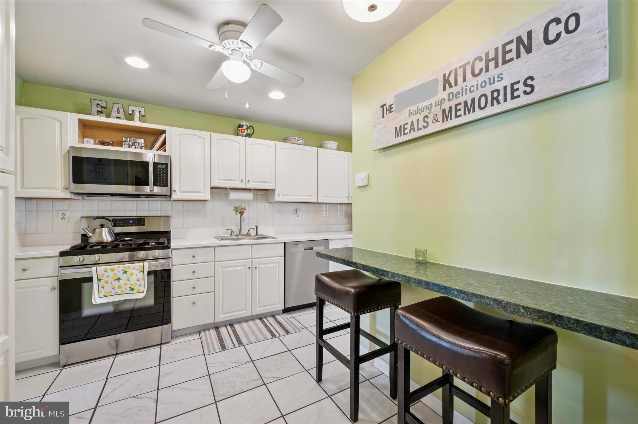 15 Paul Road Maple Shade, NJ 08052 - Photo 11 of 26 a kitchen with a sink cabinets and window