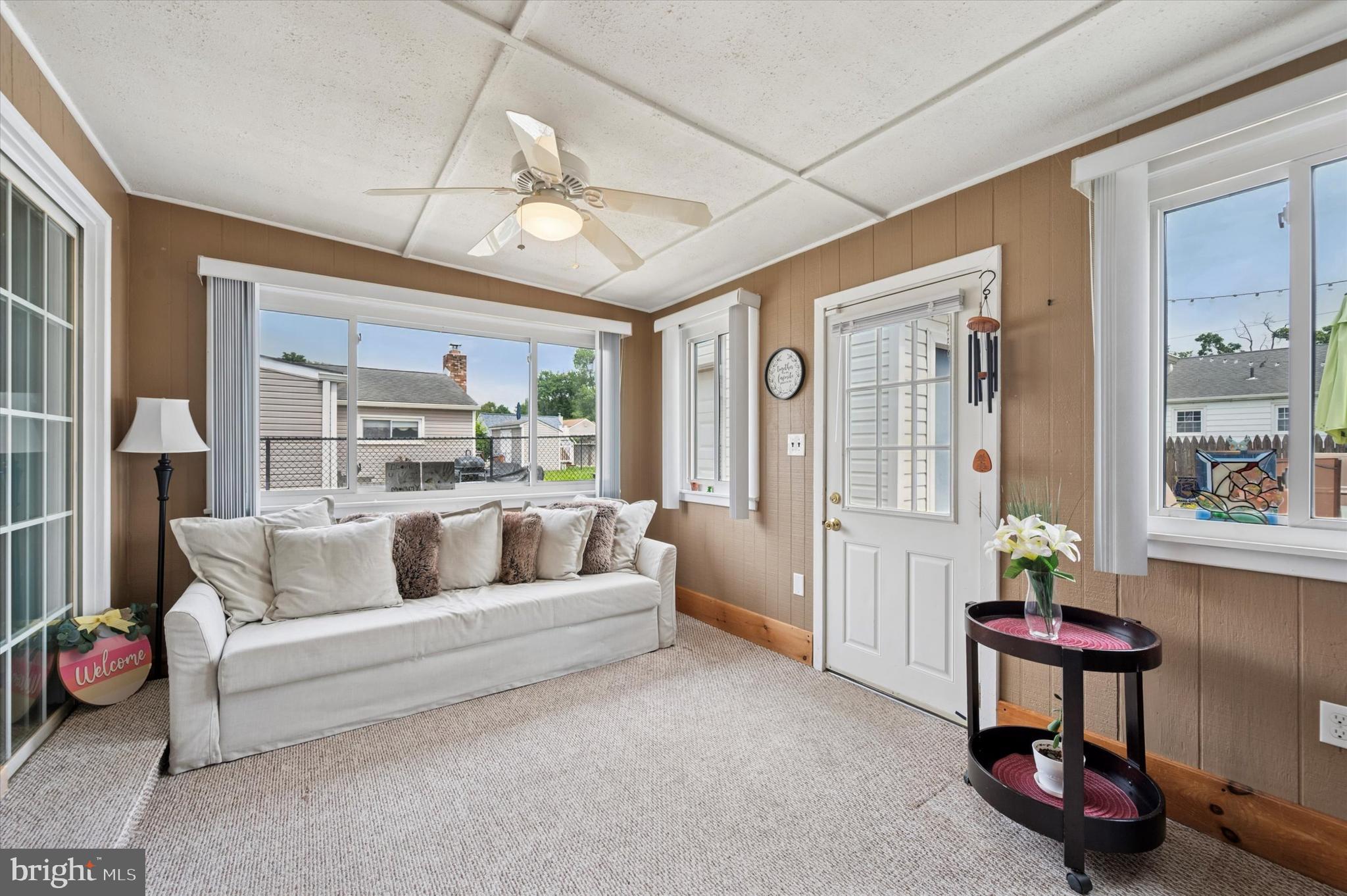 15 Paul Road Maple Shade, NJ 08052 - Photo 22 of 26 a living room with furniture and a large window