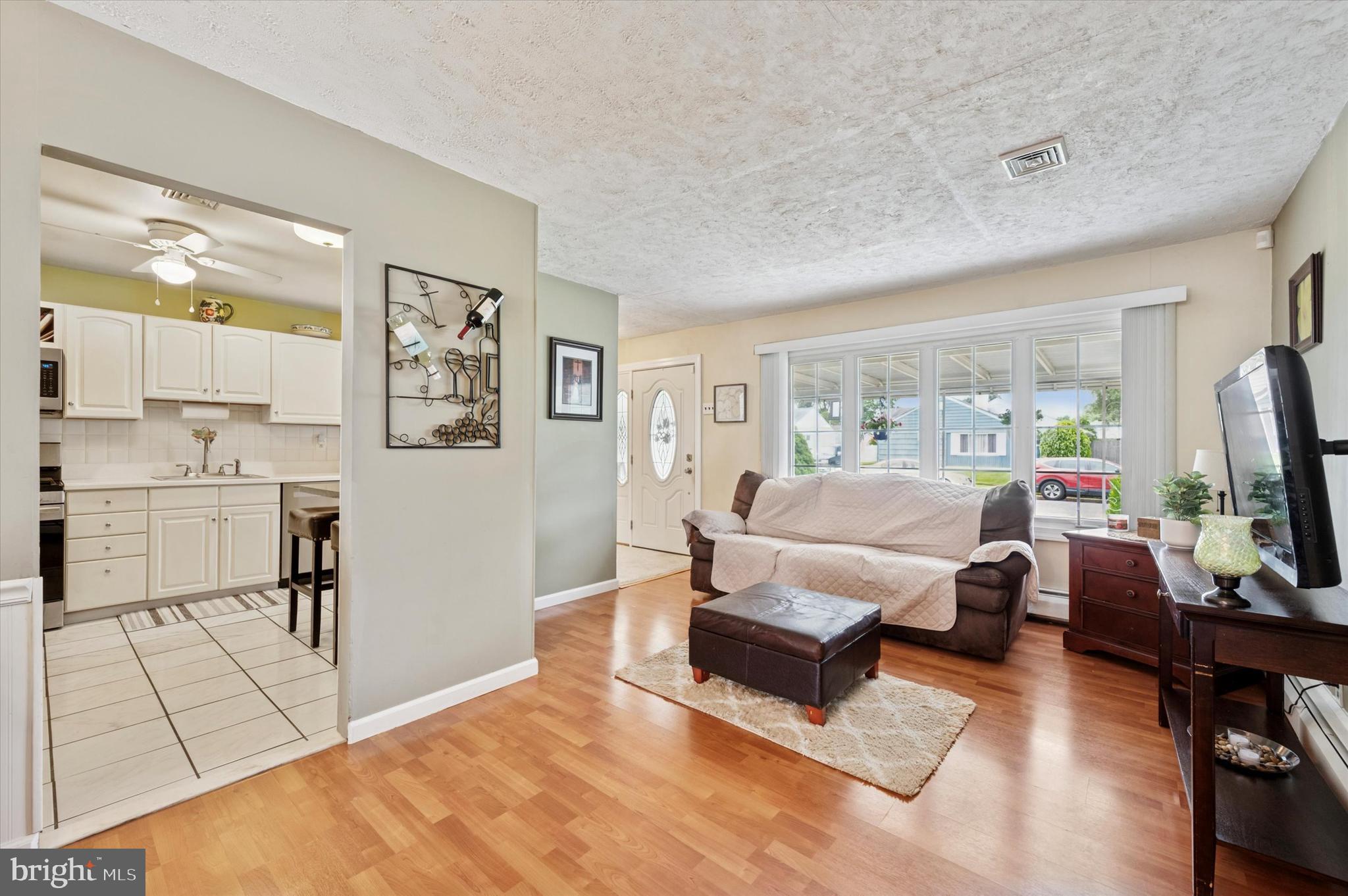 15 Paul Road Maple Shade, NJ 08052 - Photo 5 of 26 a living room with furniture and a flat screen tv
