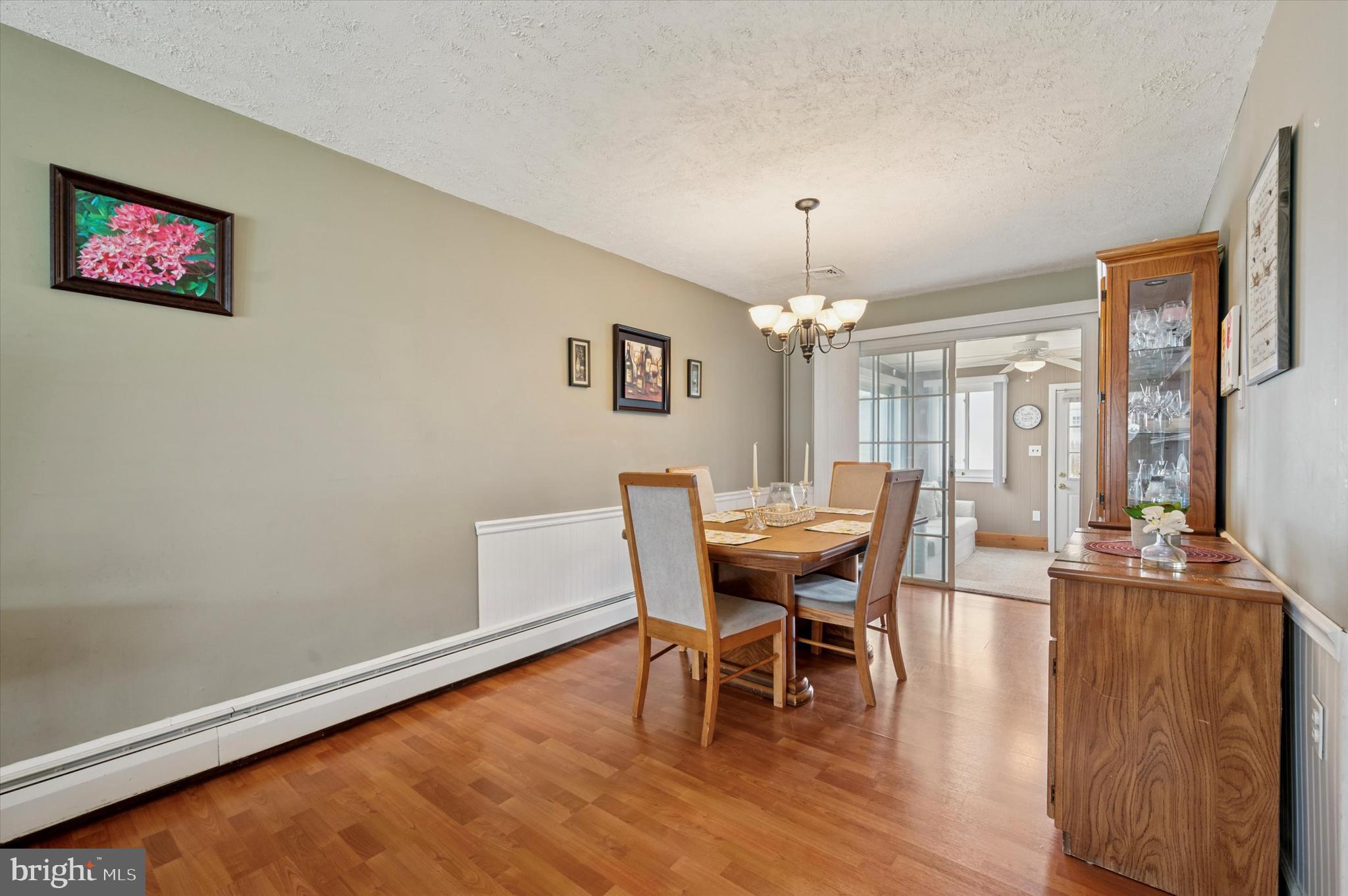 15 Paul Road Maple Shade, NJ 08052 - Photo 6 of 26 a view of a dining room with furniture window and wooden floor