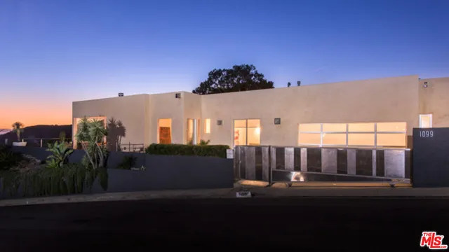 a view of balcony with furniture