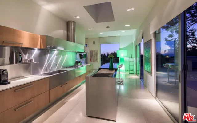 a view of roof deck with patio