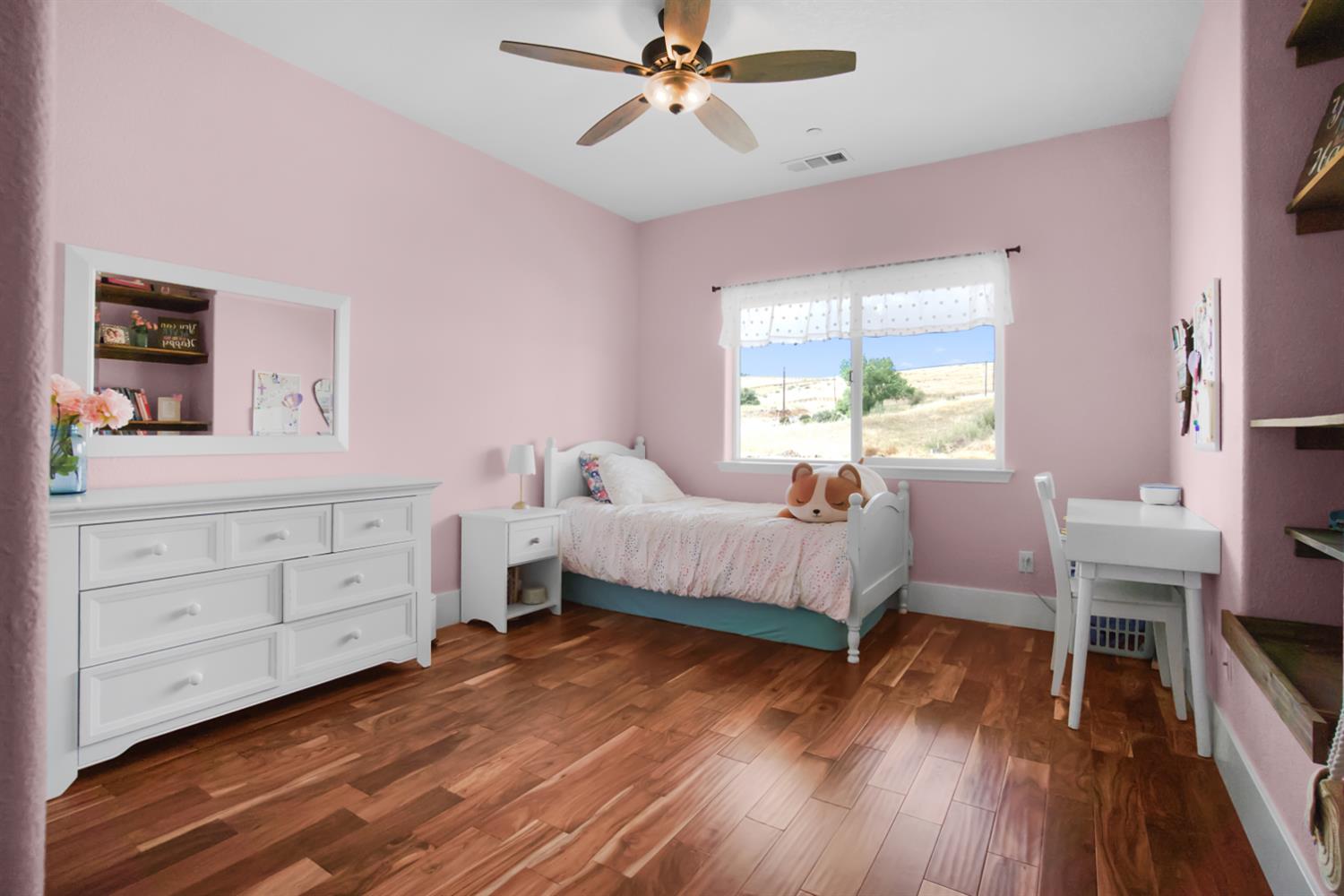 7991 South Shingle Road Shingle Springs, CA 95682 - Photo 32 of 58 a bedroom with a bed and a dresser