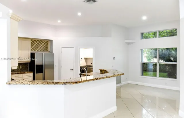 $5,900 | 6543 Northwest 72nd Place, Parkland, FL 33067