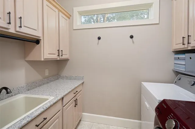 a view of cabinets and sink