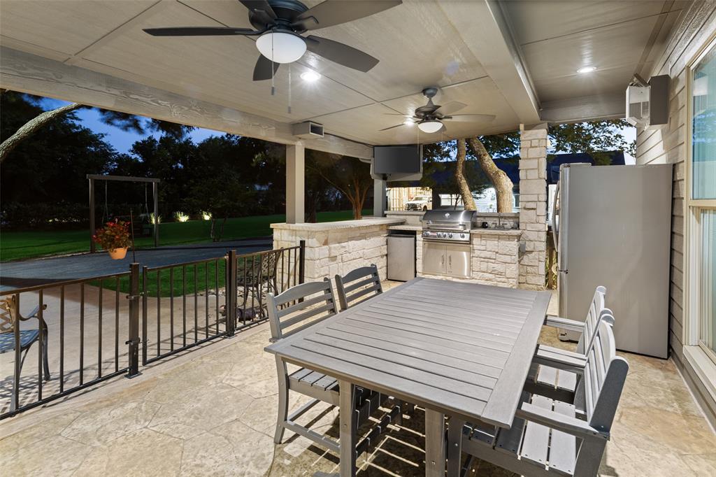 1814 Stacy Road Fairview, TX 75069 - Photo 25 of 36 a view of a kitchen and outdoor seating