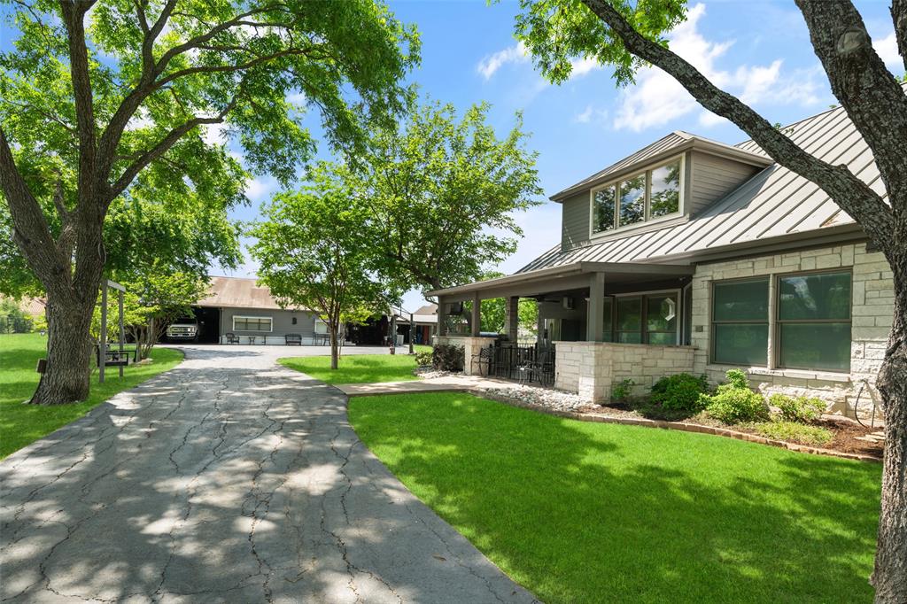 1814 Stacy Road Fairview, TX 75069 - Photo 27 of 36 a view of a house with a yard and sitting area