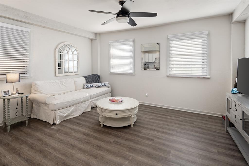 1814 Stacy Road Fairview, TX 75069 - Photo 32 of 36 a living room with furniture and a window