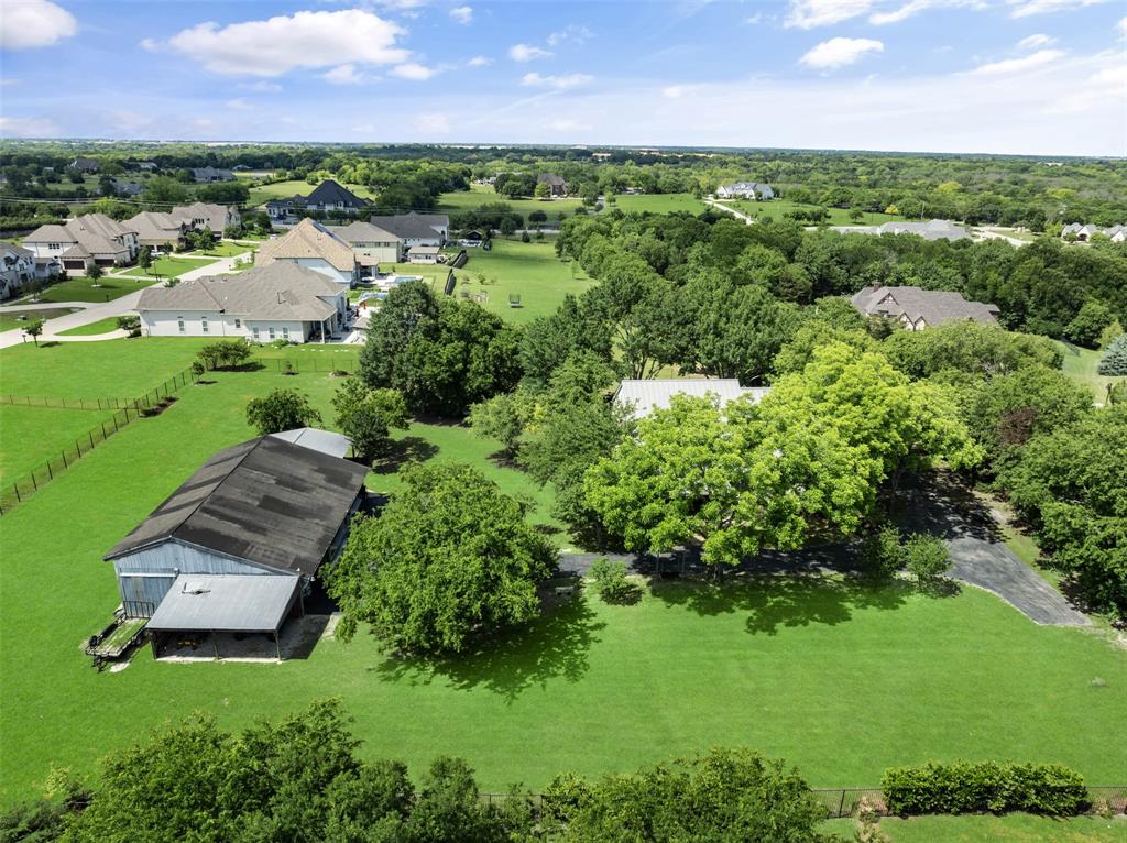 1814 Stacy Road Fairview, TX 75069 - Photo 34 of 36 an aerial view of a houses with a yard and lake view