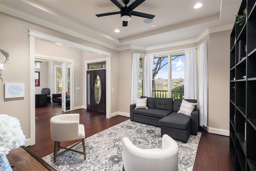 1814 Stacy Road Fairview, TX 75069 - Photo 9 of 36 a living room with furniture and a large window